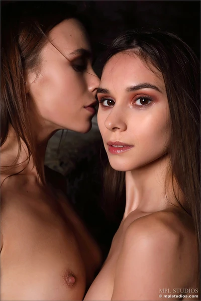 Serafina kisses Leona Mia on the head